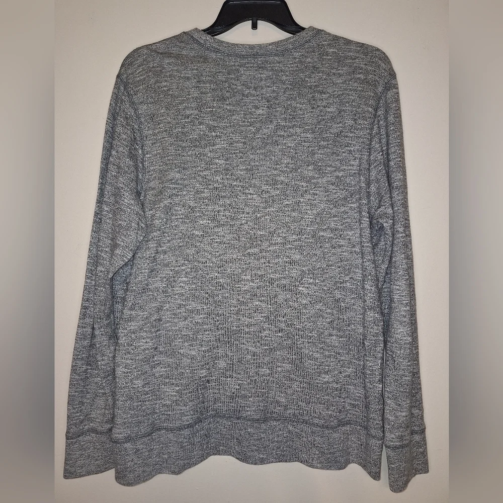 A The North Face men's cotton sweatshirt in a size large. Pre-loved